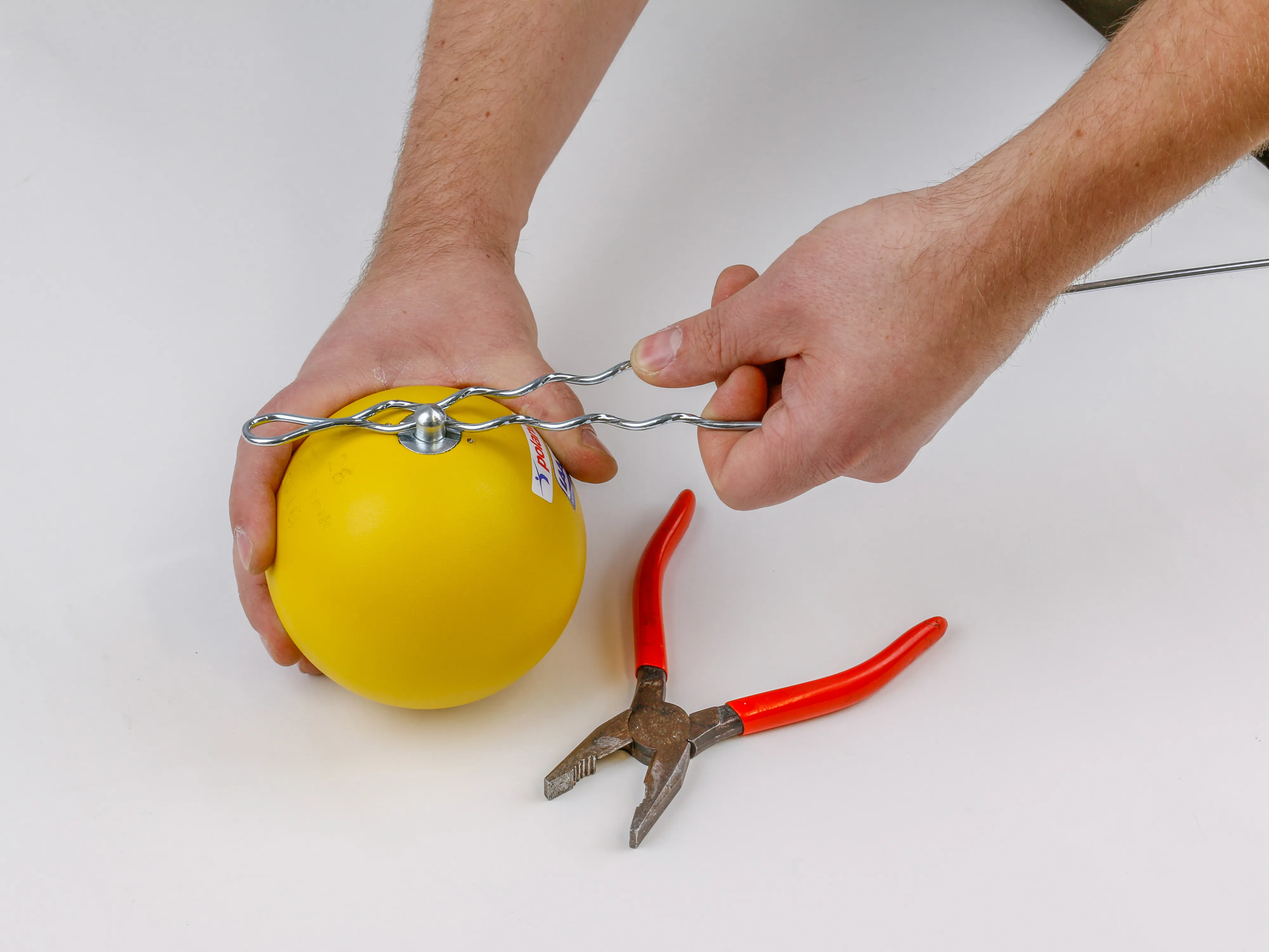 Throwing Hammer Assembly